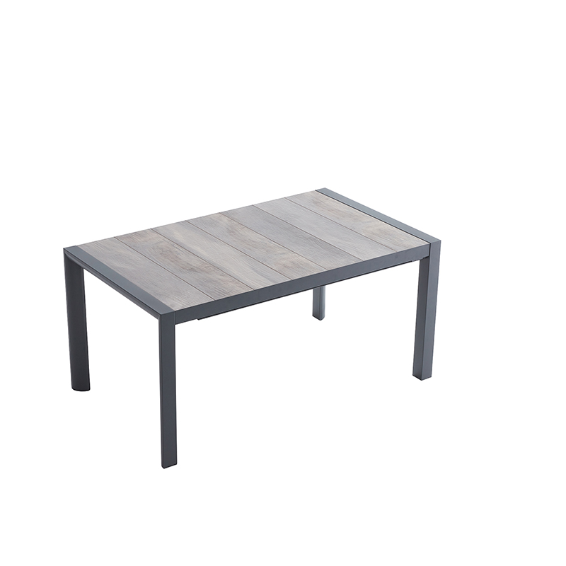 Extendable outdoor dining table setup on a patio